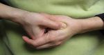 pressing acupressure points on hand